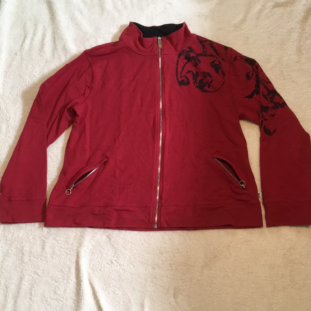 Red zipup sweater, floral pattern on sleeve & back